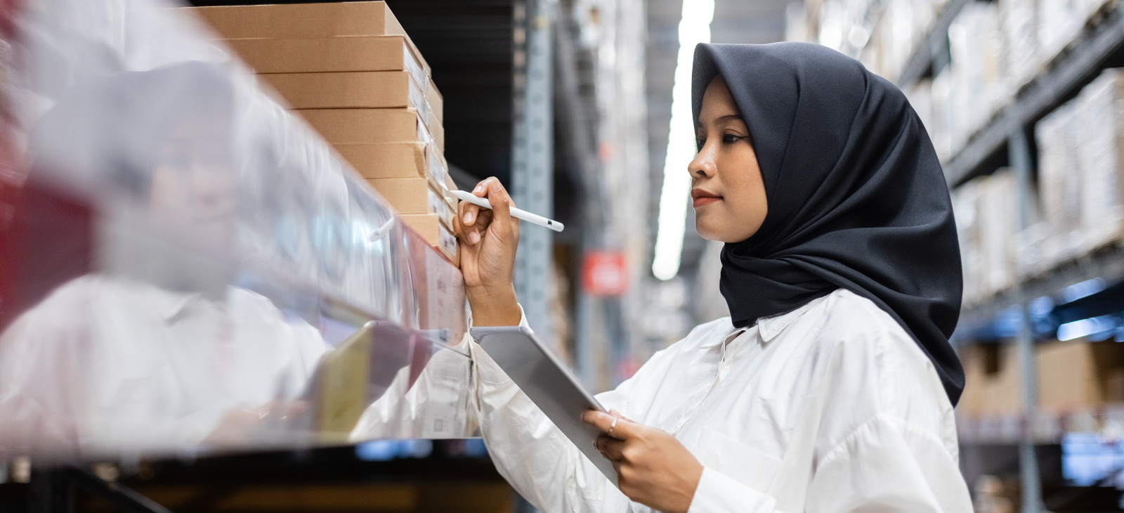 Worker checking the product list