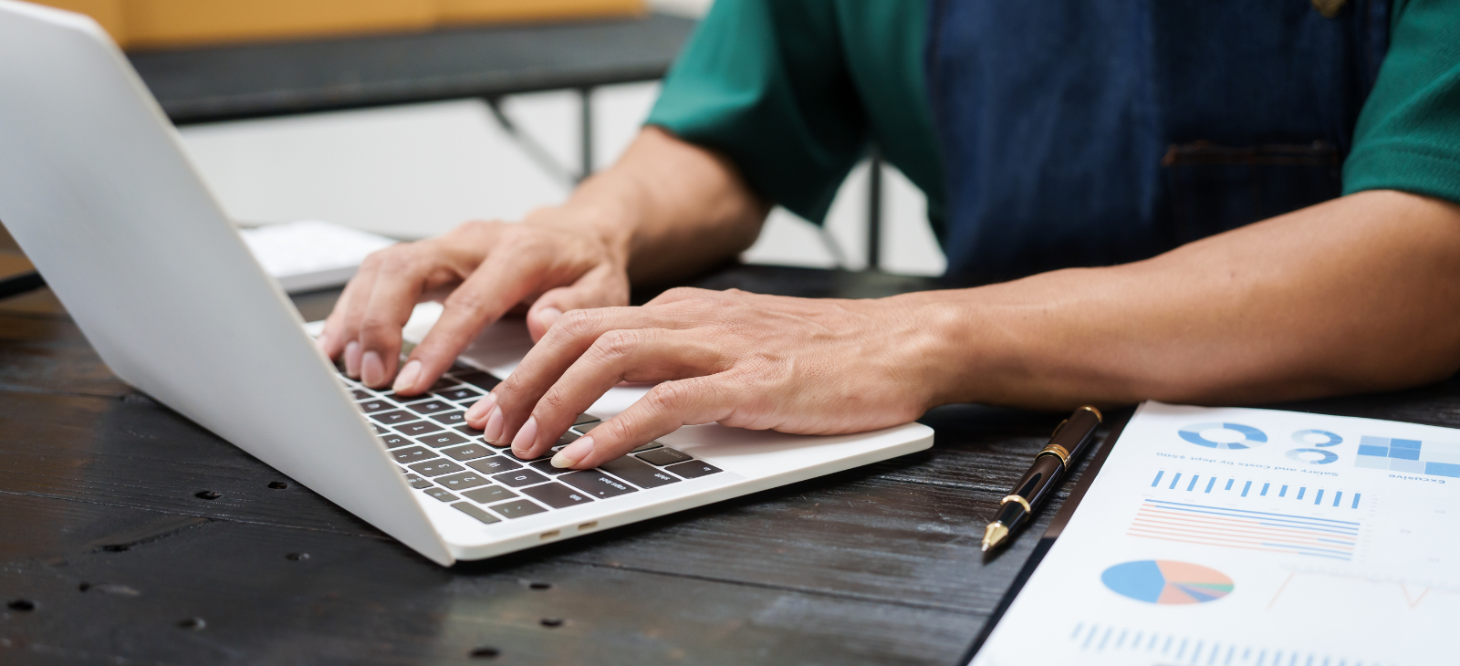 Person with the laptop managing inventory data